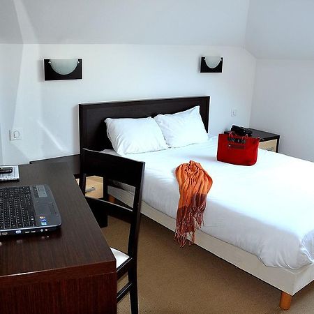 Hotel Les Benedictins Лимож Номер фото